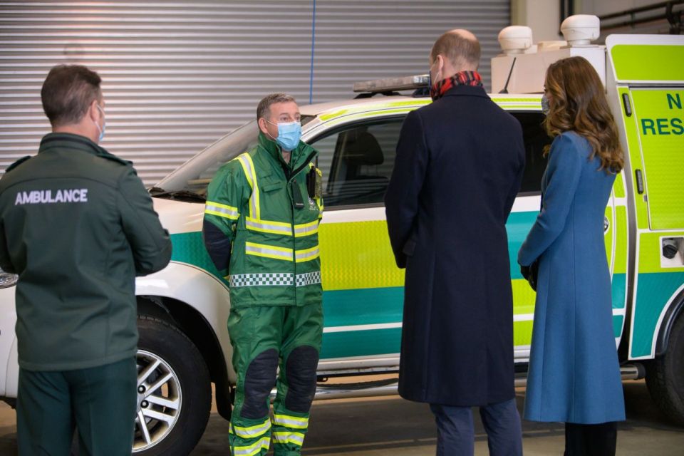 The couple spoke with paramedics during the tour