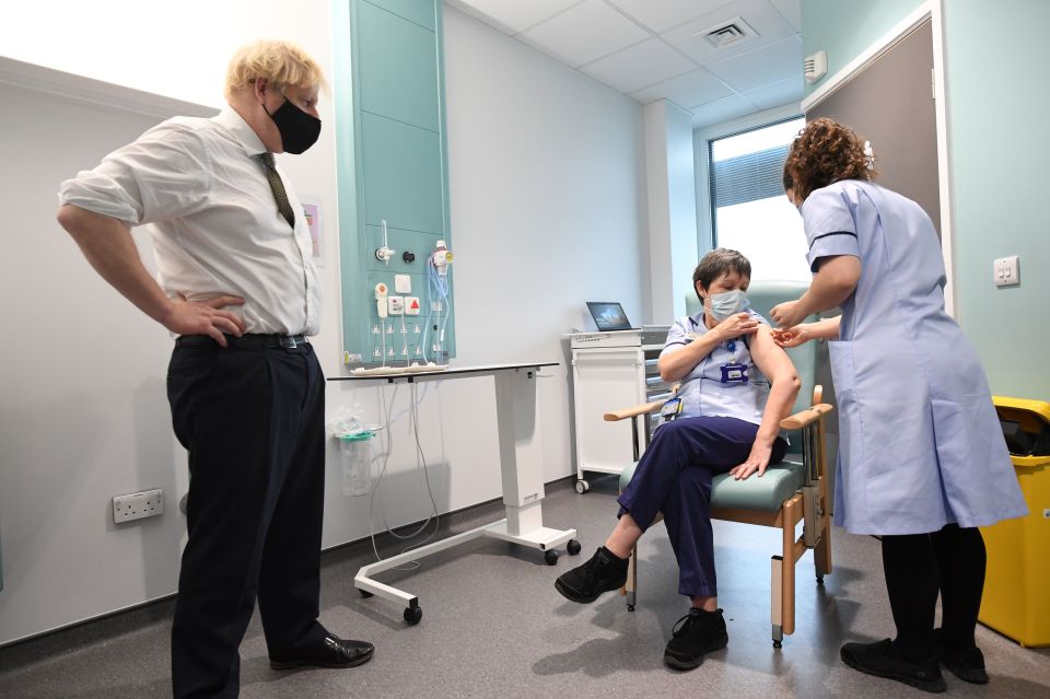 The PM - who today watched as the first Brits were inoculated with the Oxford vaccine - says restrictions must stay in place until mid-February