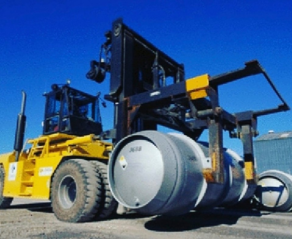 Iran has ramped up its uranium production to 20% which is breach of the 2015 nuclear deal. Pictured: A forklift carries a cylinder containing uranium hexafluoride gas to Iran's Fordo nuclear facility (2019)