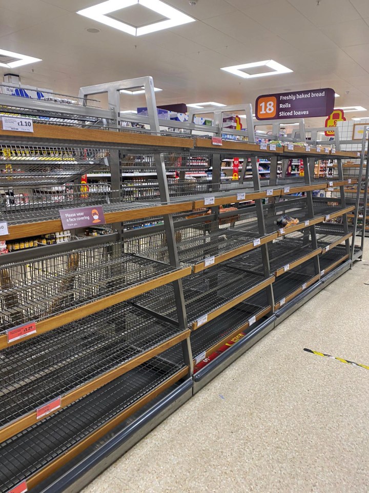 Stripped shelves in the bread aisle of Sainsbury's in Brentwood, Essex 