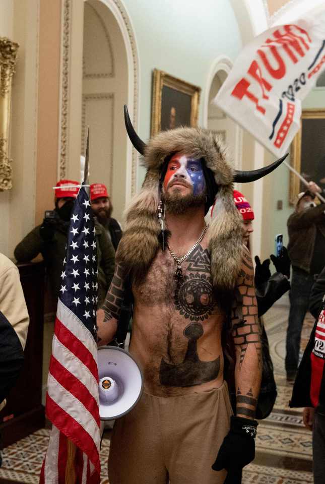 Jake Angeli, 32, stormed the Capitol shirtless wearing horns and a fur