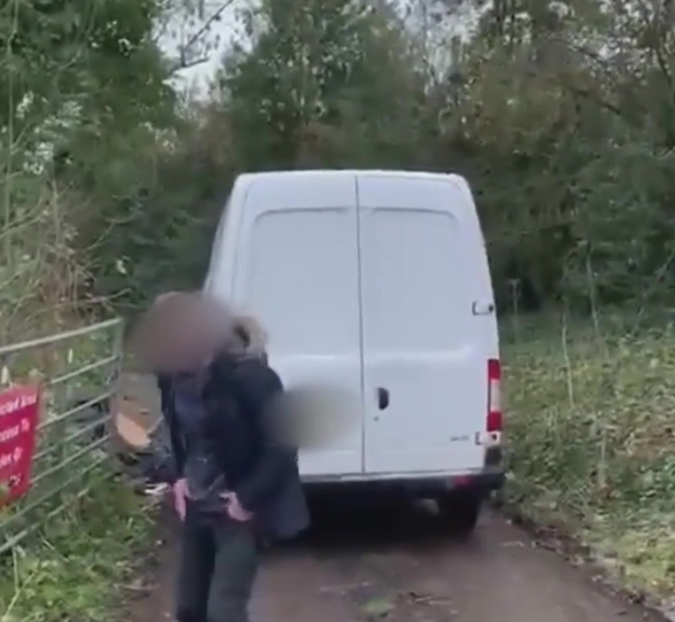 The fly-tipper was caught on film by a litter vigilante as he dumped trash on a woodland lane