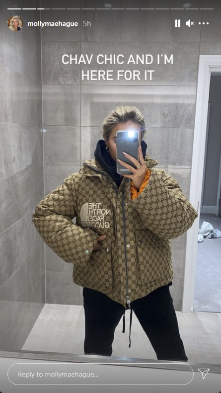 Molly-Mae Hague showing off her expensive jacket