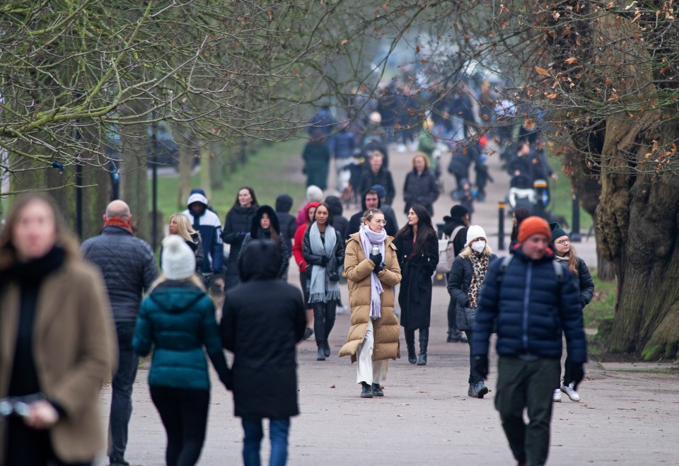 People out and about in a busy Greenwich Park, London, yesterday