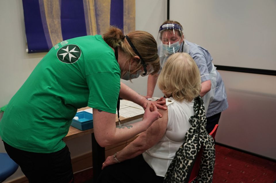 Mary Williams receives an injection of a Covid-19 vaccine at the NHS vaccine centre that has been set up at the Centre for Life in Times Square, Newcastle