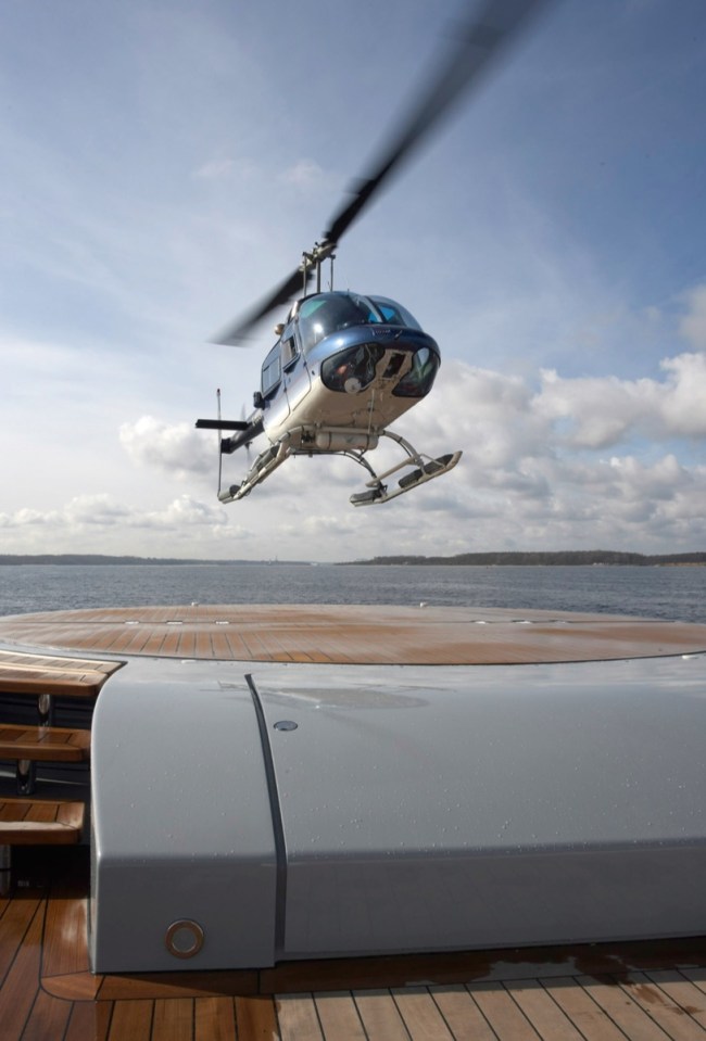 A helipad allows guests to fly on and off board