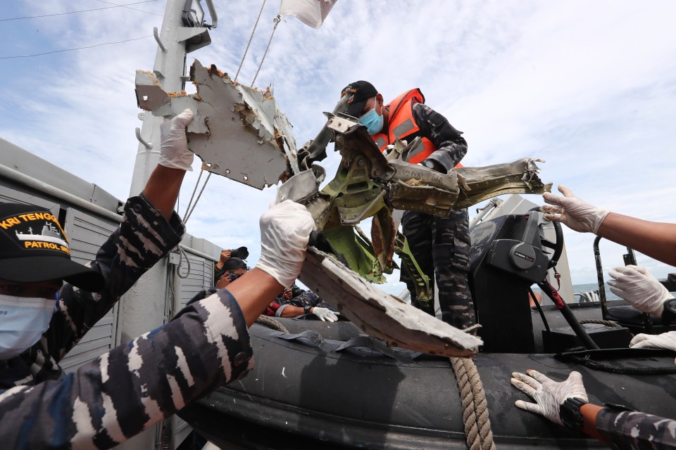 Search teams are scouring the Java Sea for wreckage and bodies