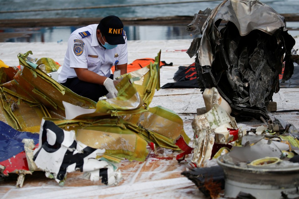 Experts are examining each piece of debris for clues