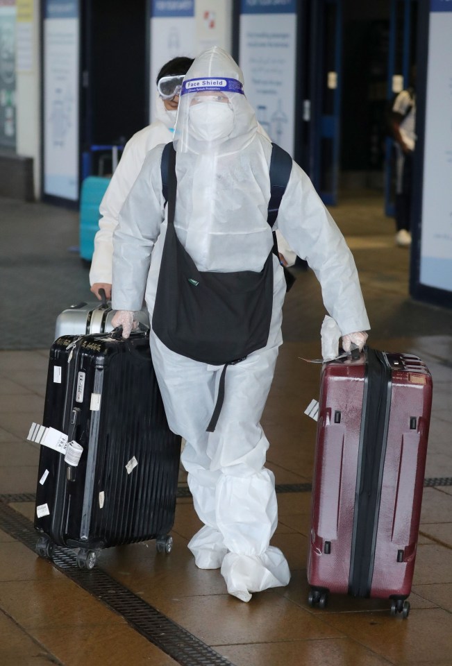 Some travellers took extra precautions as new Covid variants threaten Britain