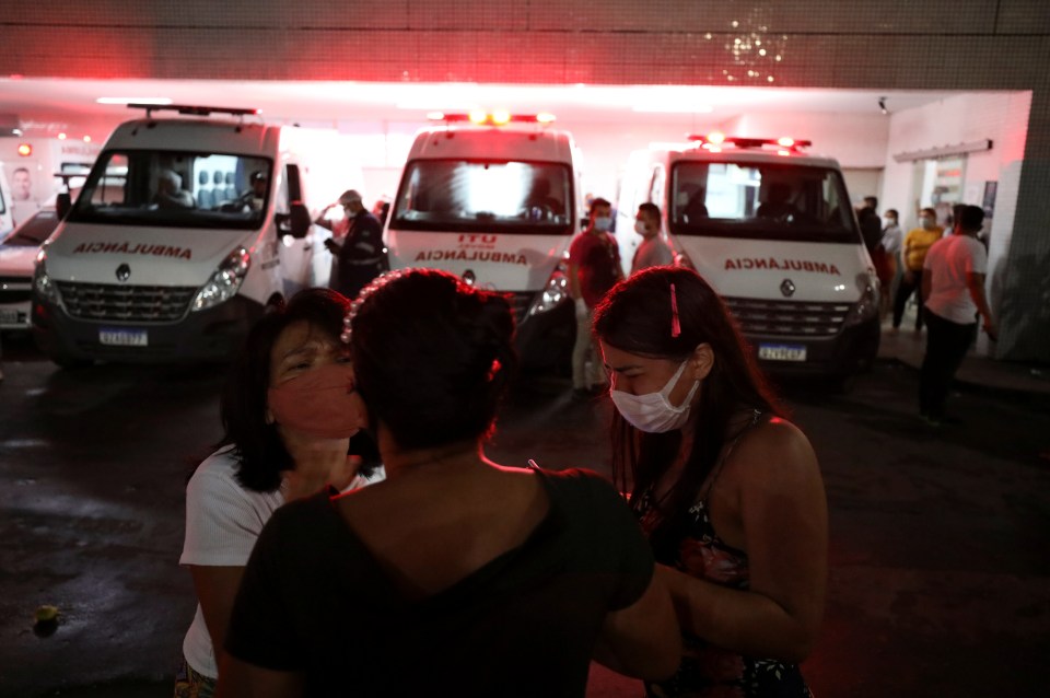 Relatives of patients hospitalized at the 28 de Agosto hospital weep amid the Covid surge