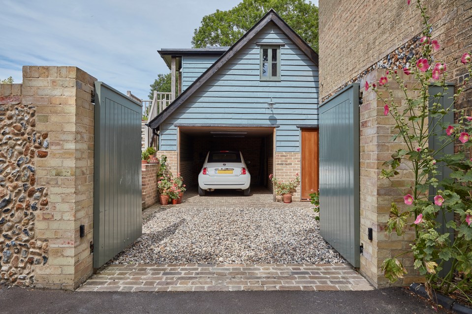 Outside there is a private walled garden and a former cart store, which has been converted into a home office