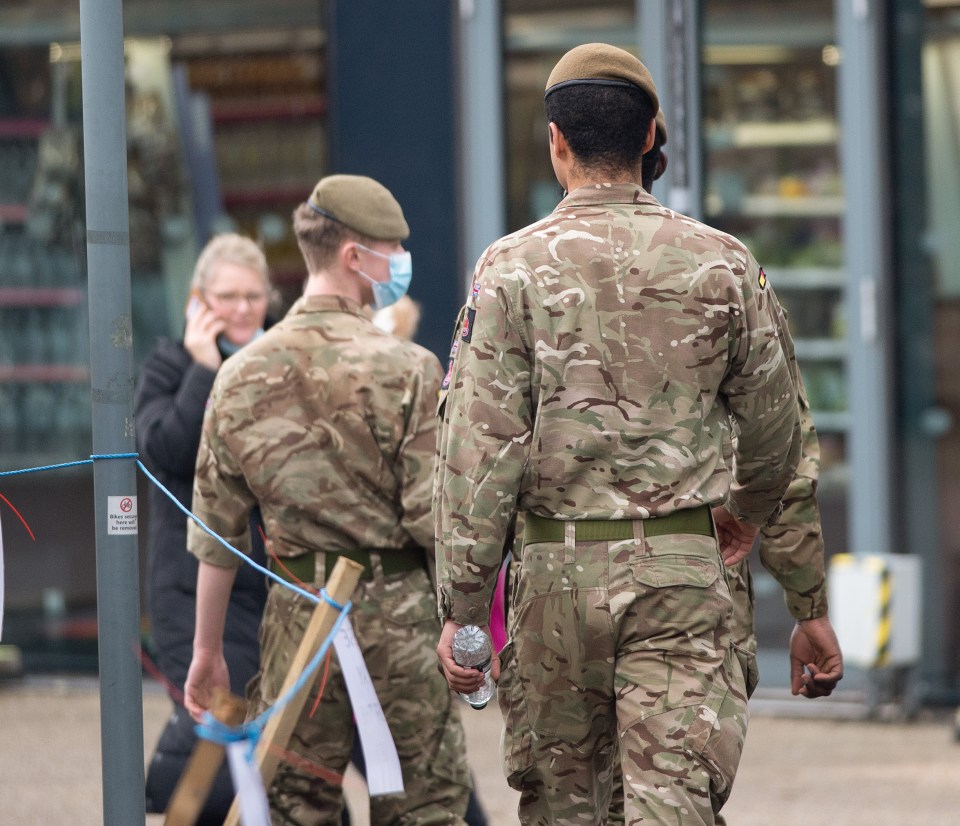 Soldiers arriving at St George’s Hospital in south London to help with mass vaccination