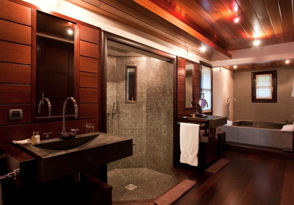 The modern bathrooms follow a similar interior to the rest of the house