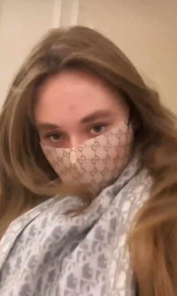 Elizaveta, 17, sports a designer facemask in pictures posted to her social media