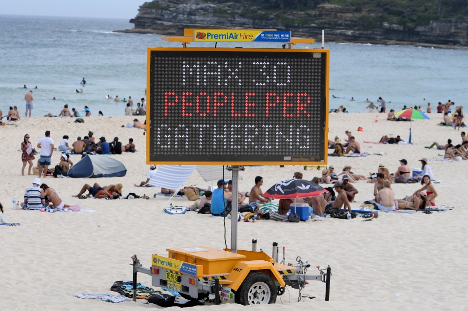 Local authorities on Bondi Beach used signs to deter people from gathering in large groups