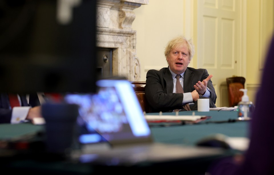 Boris Johnson, pictured chairing a Cabinet meeting today, is addressing Brits from No10 this evening