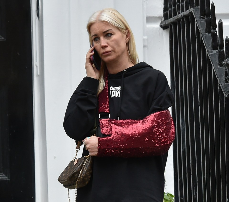 Denise Van Outen outside a London clinic with her arm in a sling