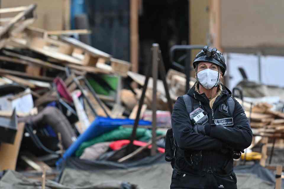 One of the people involved in removing the protests stands at the site