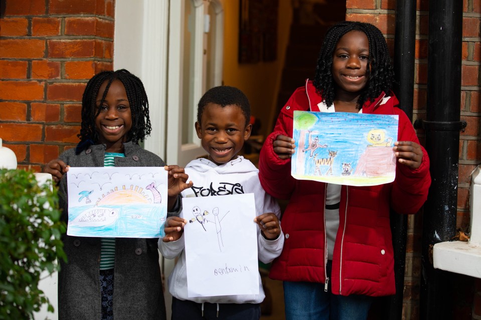 Stephanie, Benjamin and Shalomy proudly showcase their artwork