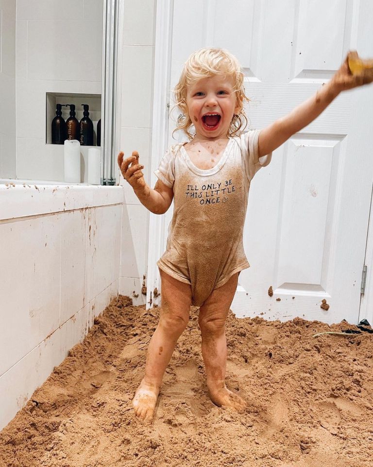 Little Rex had lots of fun at the 'beach' - even if he did get a little sandy