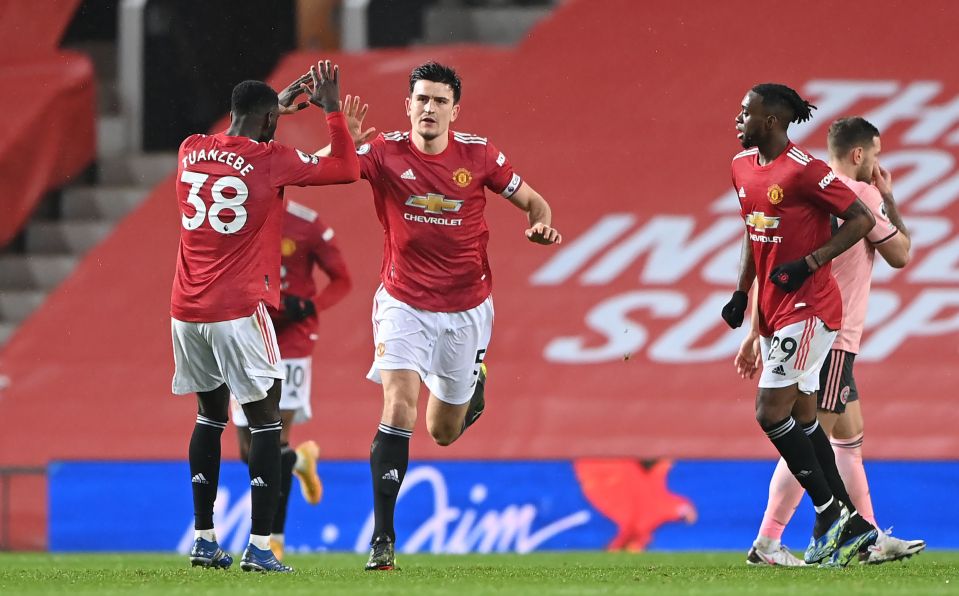 Harry Maguire celebrates after heading an equaliser that he wrongly must have thought would have got Man Utd off the hook