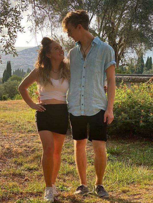 The couple take a countryside walk