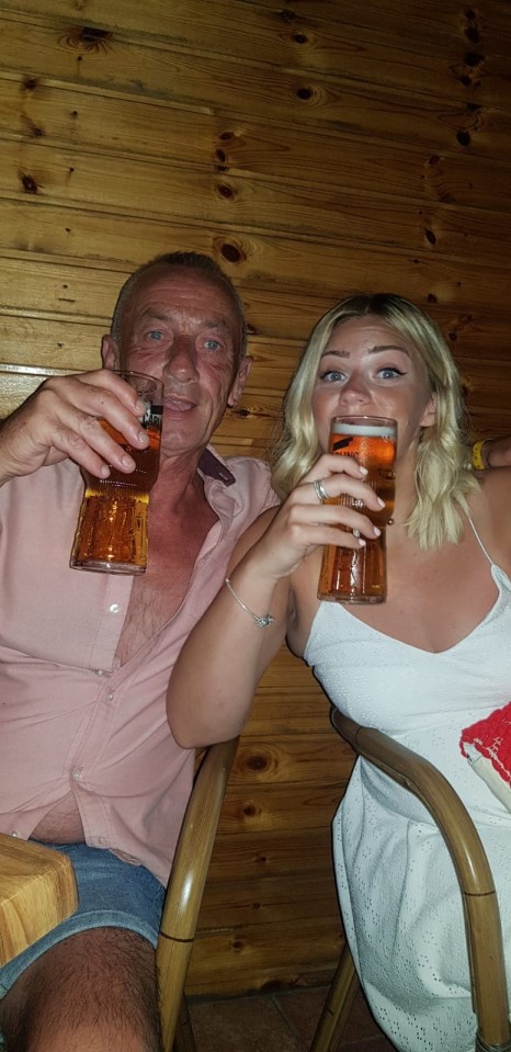 Cara poses with her dad who she was worried about seeing her in a bikini