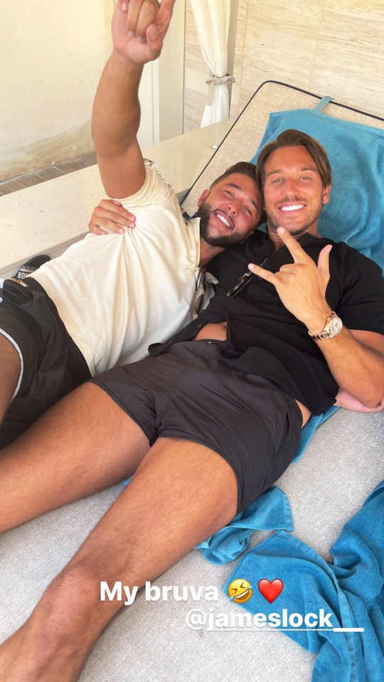 Henry Simmons and James Lock on a sunbed together