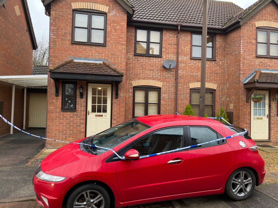 The woman was found dead at a house in Beresford Close, Milton Keynes