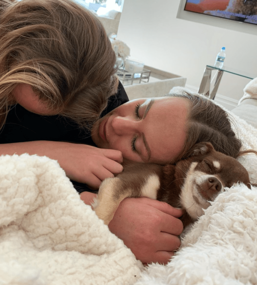 Kate, pictured last year with her dog Ronnie and step-daughter Tia, said she has been unable to get dressed yet this year