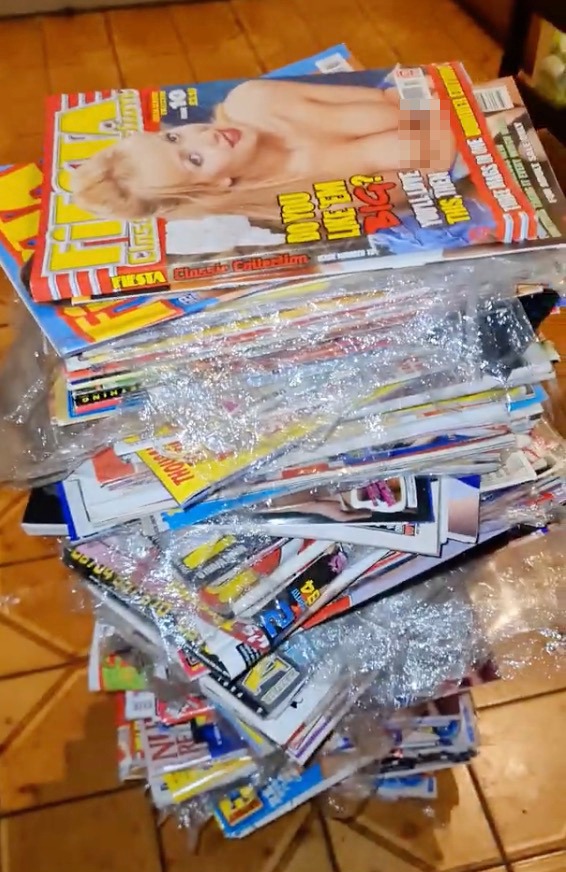 The dirty magazines can be seen stacked up in a towering heap