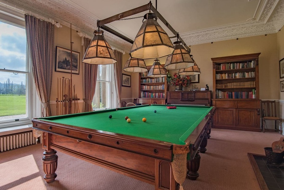 As well as a games room, guests can enjoy a sitting room, living room, kitchen/diner and access to a private terrace