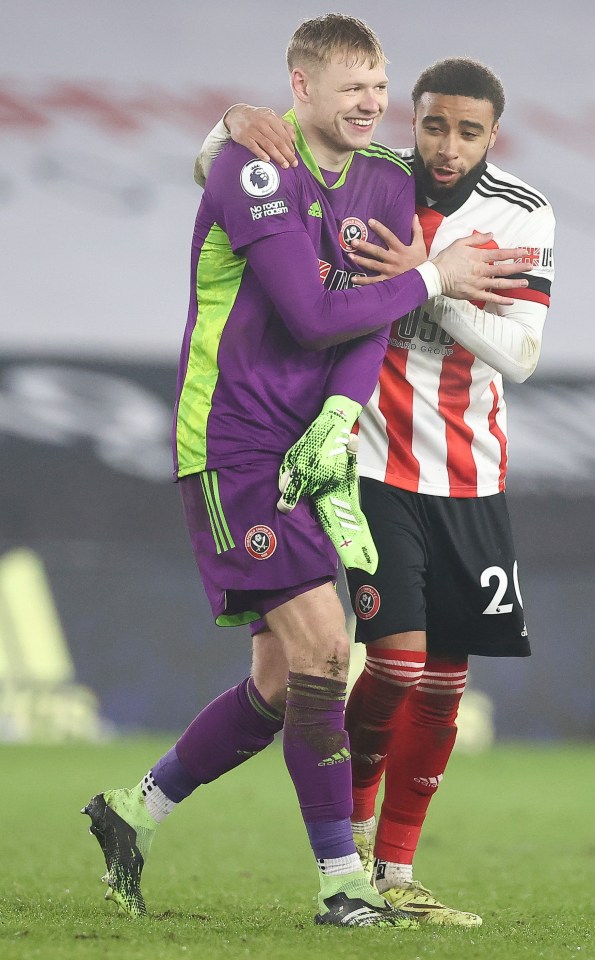 Blades' goal hero Jayden Bogle and keeper Aaron Ramsdale share joy and relief at victory