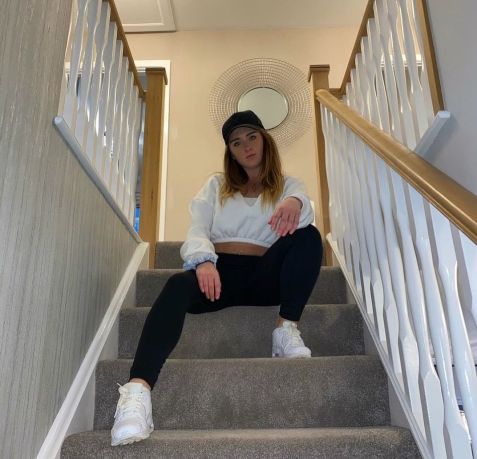 Amy has a huge staircase with neutral tones