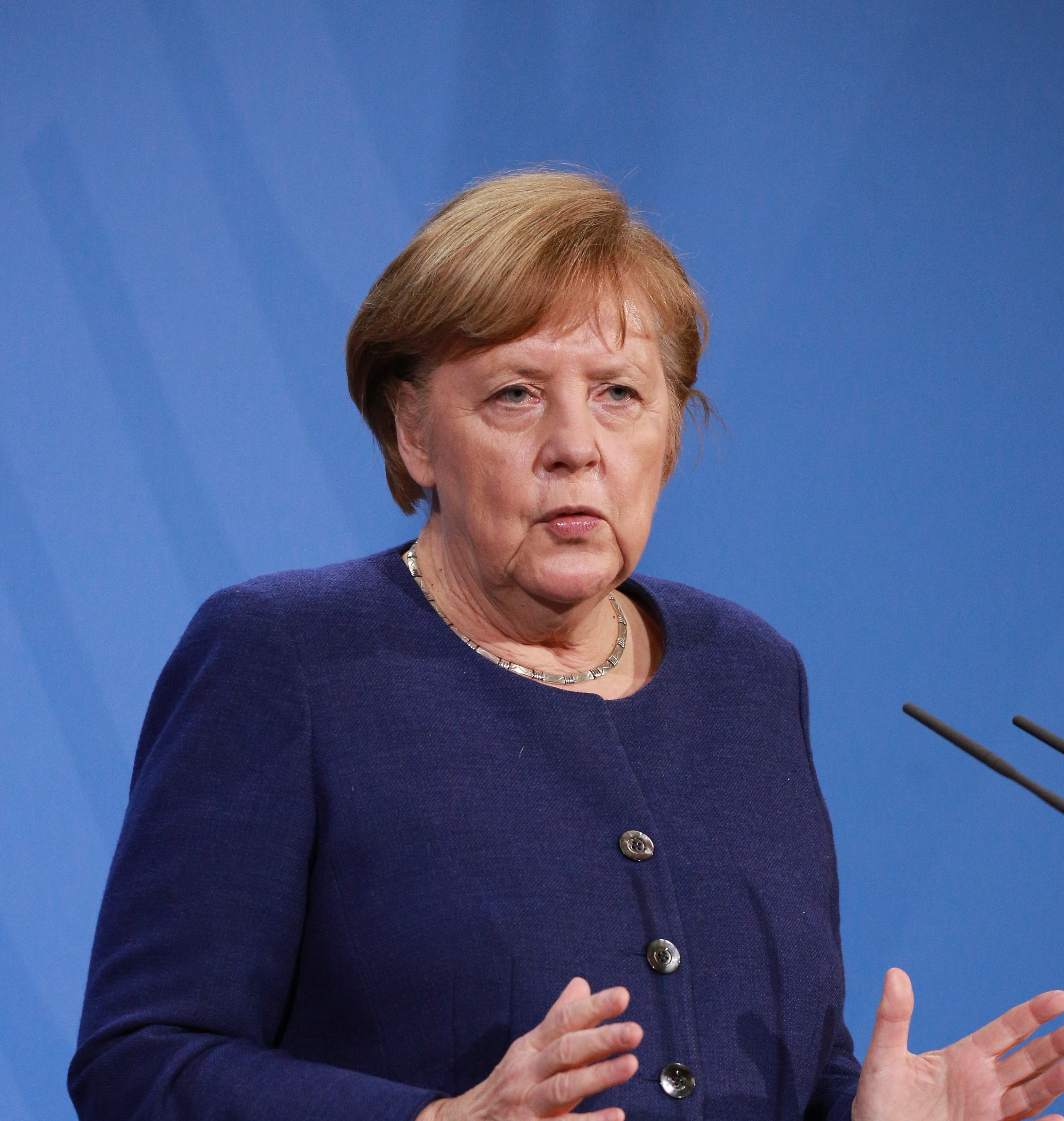 Angela Merkel is facing a mutiny among German states over her handling of the crisis