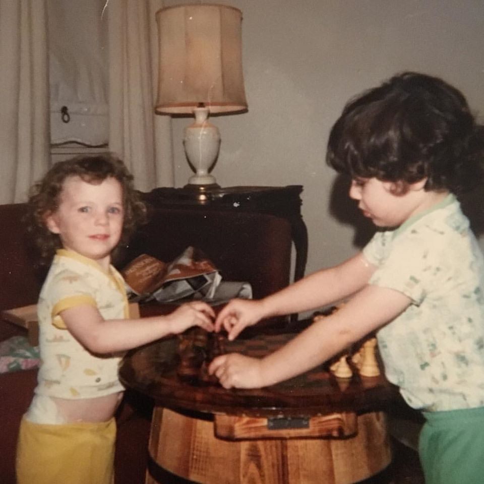 Jennifer with older brother Greg as children