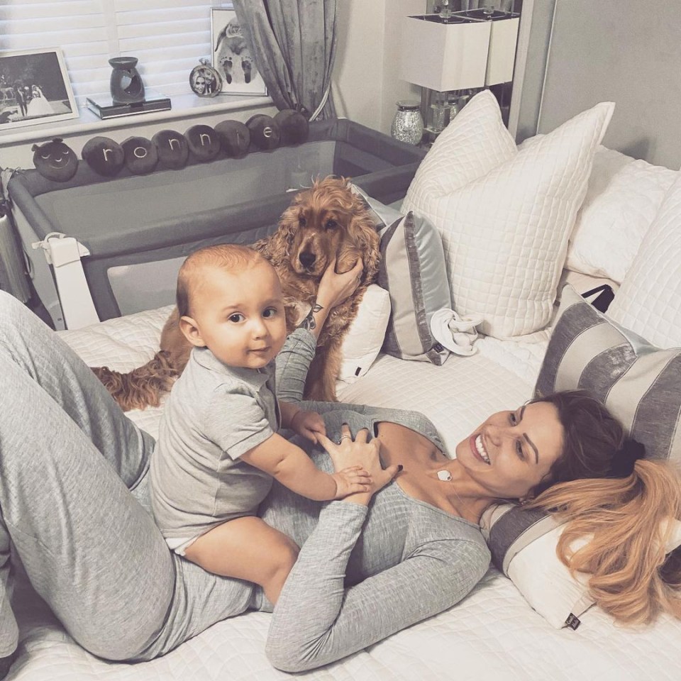 Sophie, pictured with cocker spaniel Henry, is mum to 20-month-old Ronnie