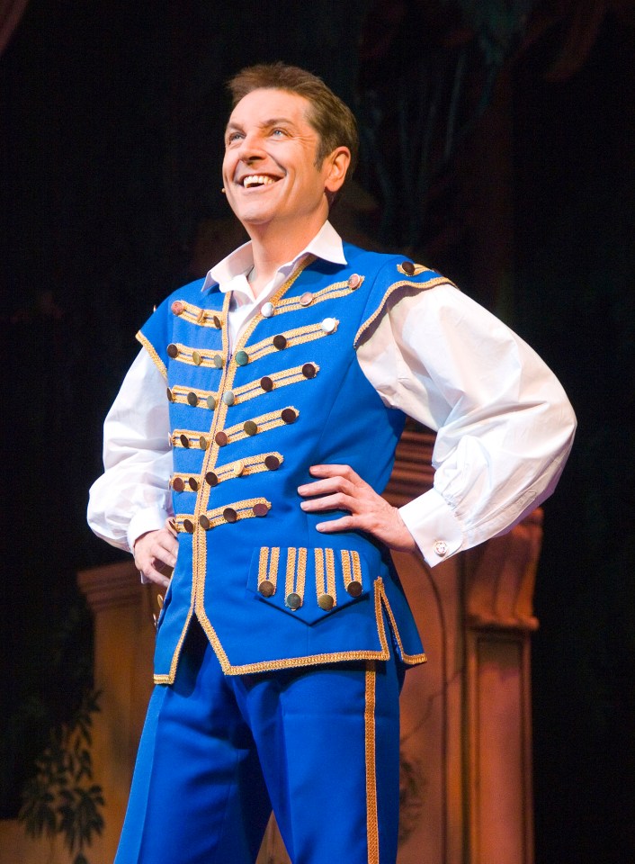 Brian gets paid big money for his panto stints. Pictured playing Buttons in Cinderella in 2008