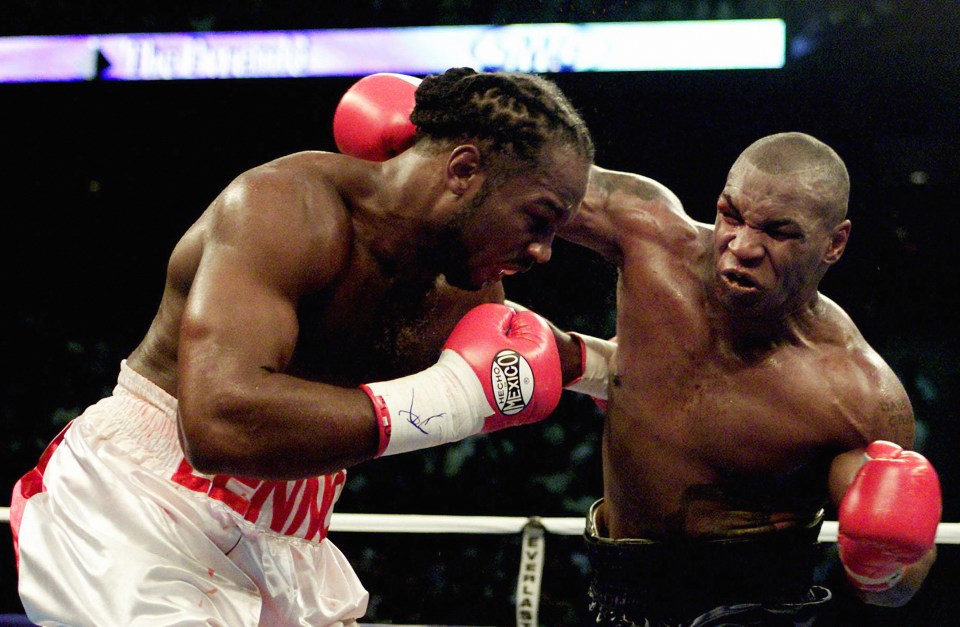 Mike Tyson unloads a vicious left hand against Lennox Lewis