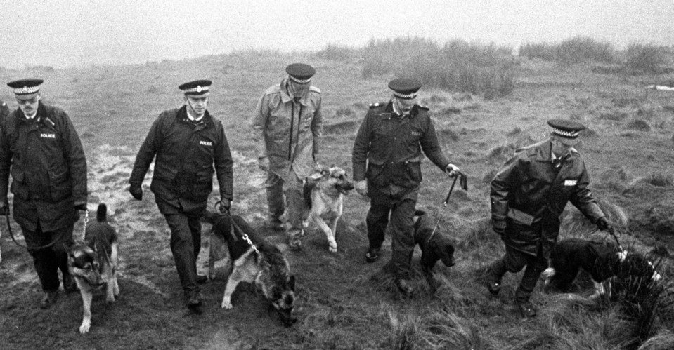 A photo dated 20/11/1986 picturing police using specially trained sniffer dogs on Saddleworth Moor, near Oldham, to search for Keith Bennett, one of the victims of moors murderer Ian Brady