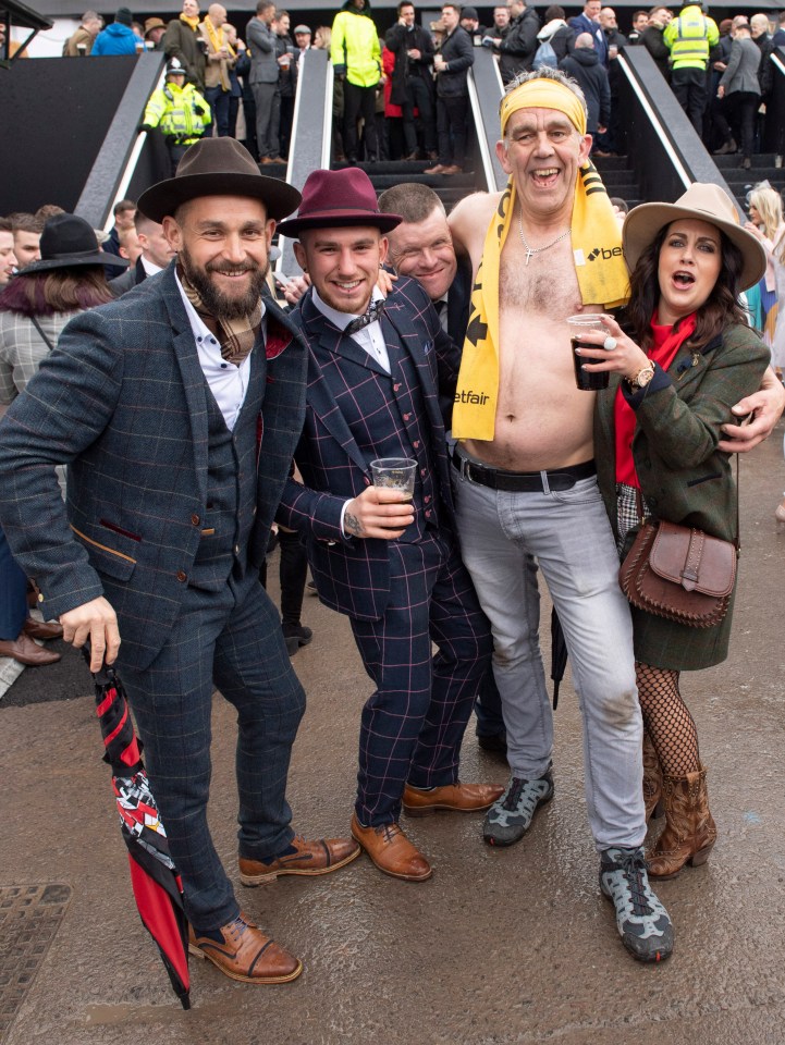 Cheltenham in March is hardly tropical but this racegoer didn't mind taking off his top