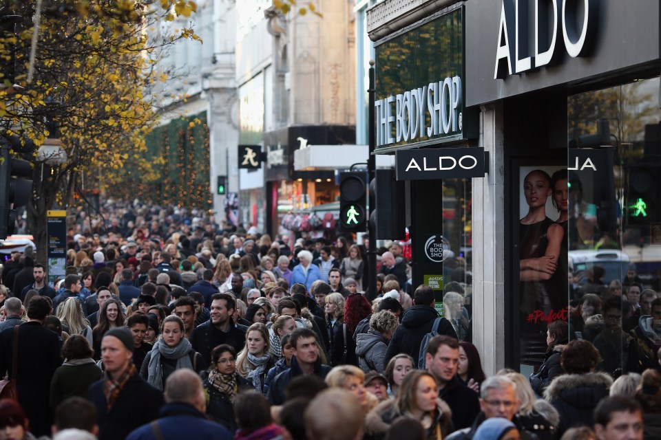 Christmas shoppers crowd Oxford Street, London, in 2014