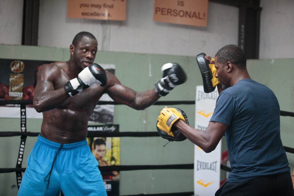 Deontay Wilder gave Mark Breland the boot after he threw in the towel in his loss to Tyson Fury