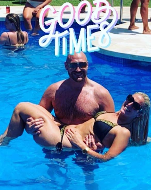 a man is carrying a woman in a bikini in a pool with the words good times above them