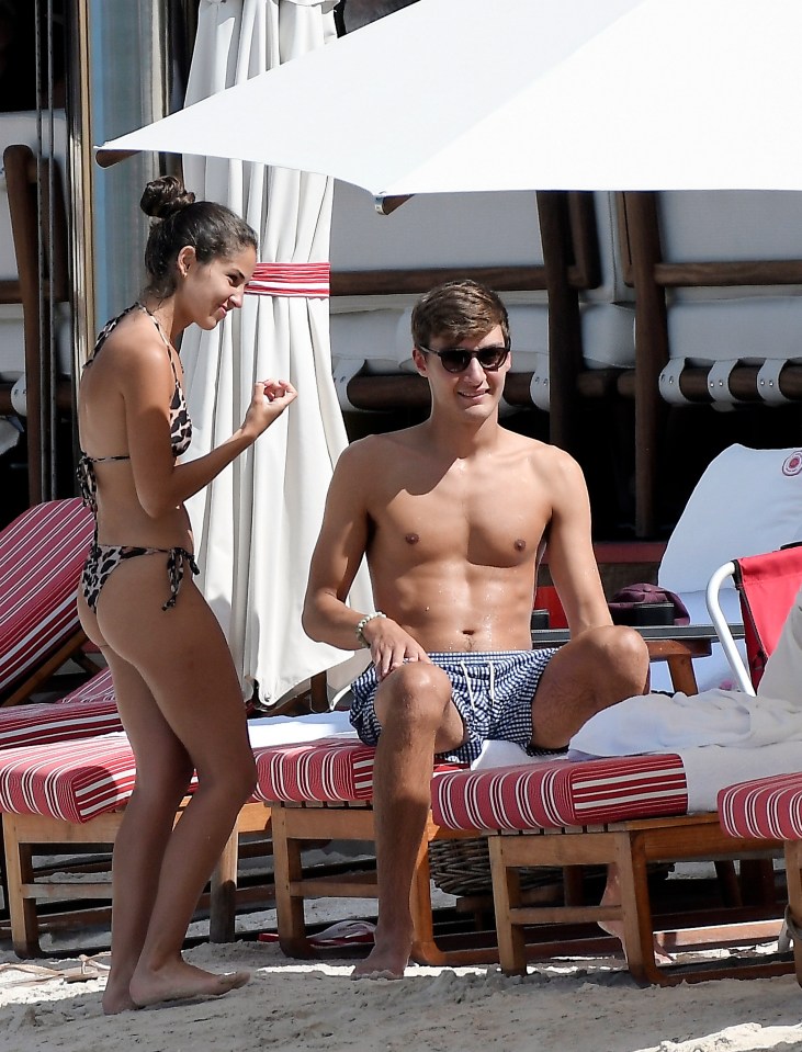 The couple soaked up the sunshine on the beach in the Caribbean