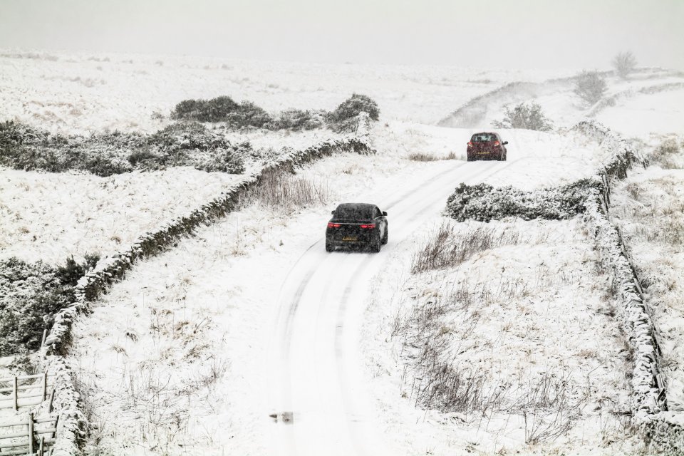 Snow falls near Morebattle village in the Scottish Borders