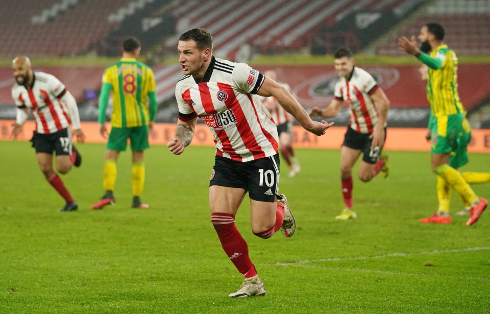 Billy Sharp wheels away to hail what he hopes will be a crucial winner for the Blades in their bid to pull off a great escape from relegation