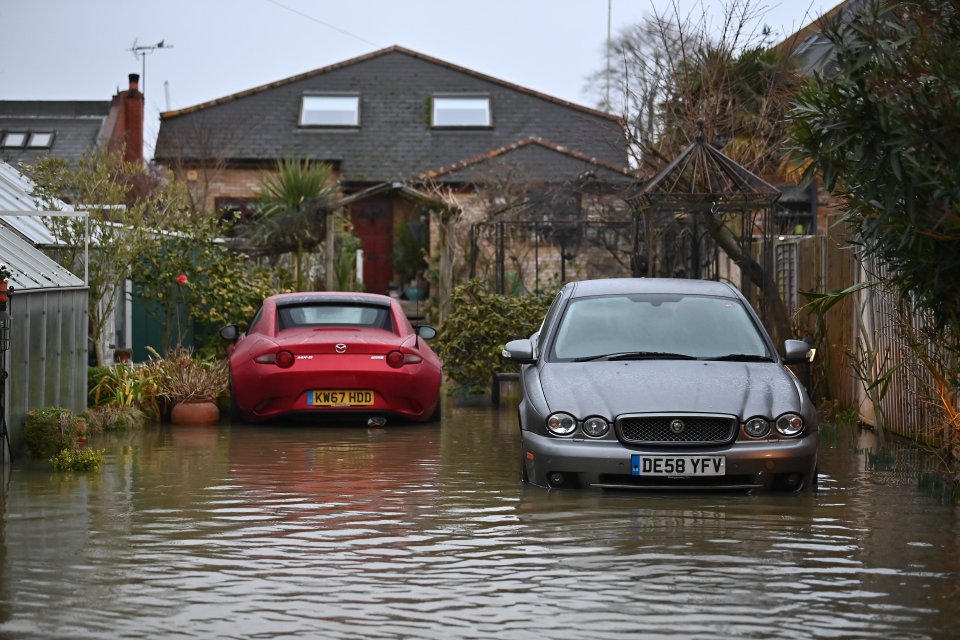 Residential properties flooded in Laleham Reach, Surrey