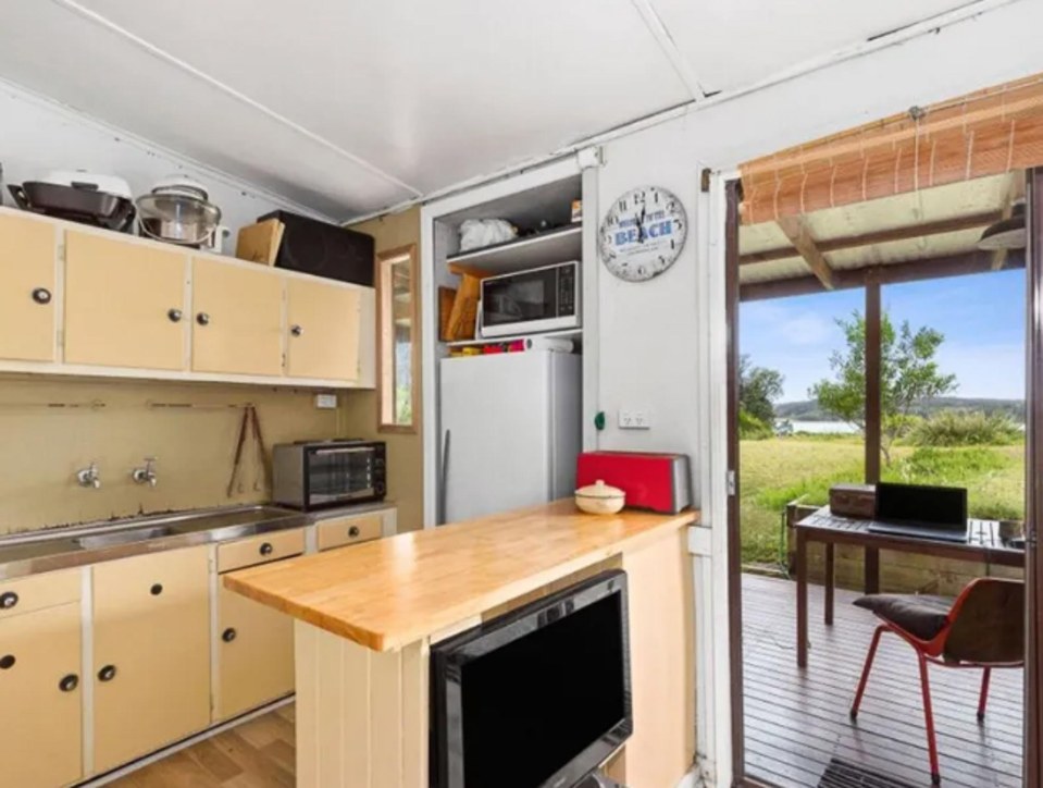 Inside are two bedrooms and an old-fashioned kitchen