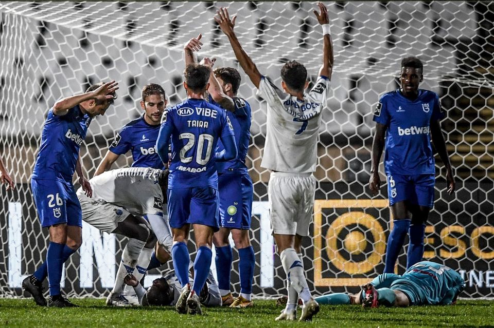 Players from both teams raced to help the defender after the clash